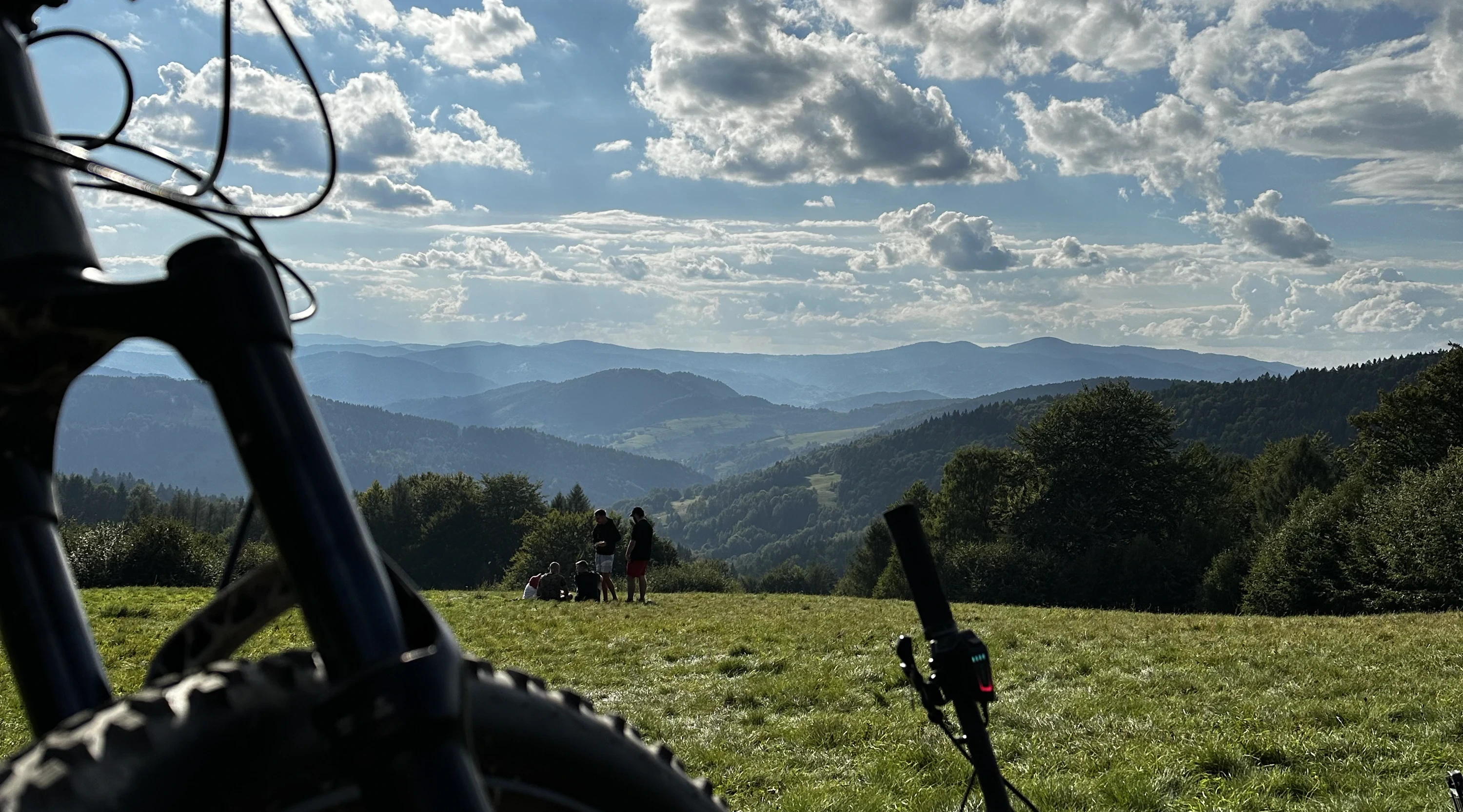 A loaded bicycle overlooking a mountain valley in Poland